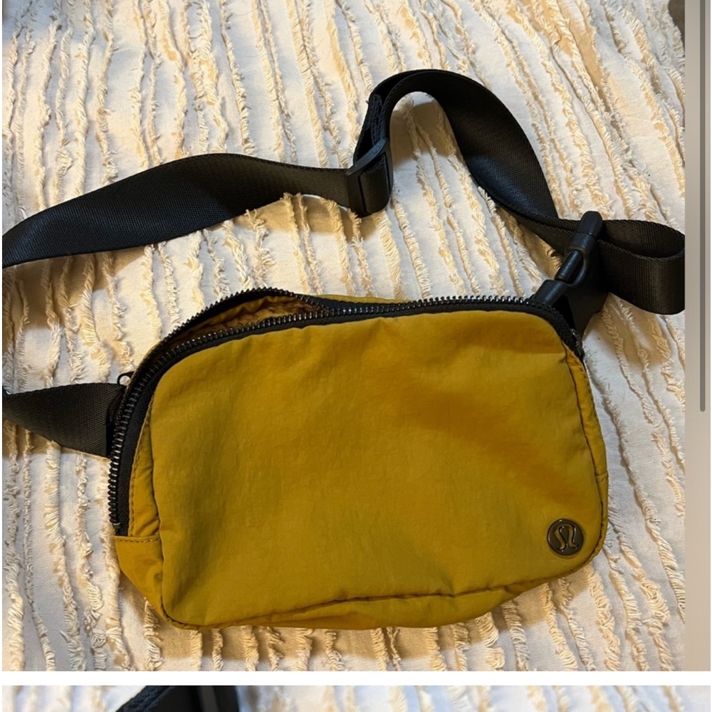 Authentic LuLuLemon Everywhere Belt Bag, mustard brown color l with black strap